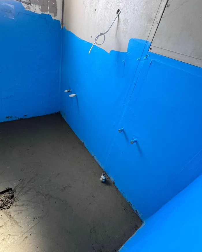 Rough-in plumbing pipework and waterproofing in a wet area before the wall linings go on