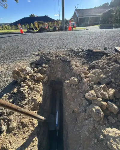 Road crossing trench open for a new water service installation
