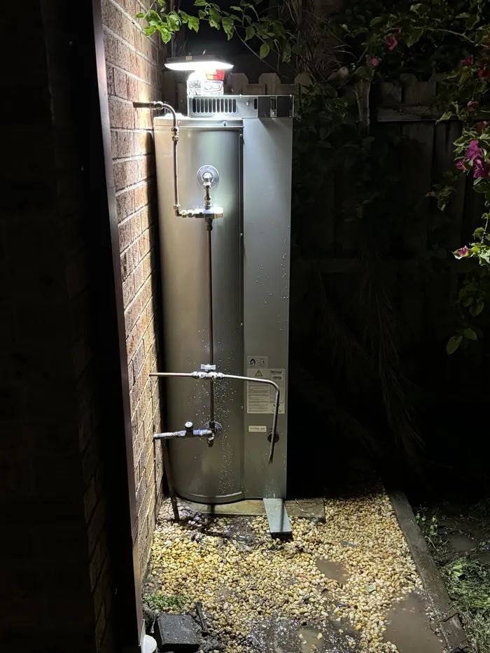 New Rinnai gas storage hot water system installed at night on a late call-out in Wattle Grove